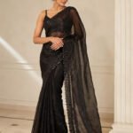 Parampara Black Lycra Saree with Heavy Self Color Work